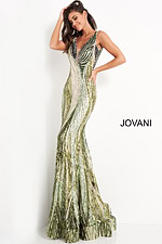 Model in Jovani 05103 green dress, holding hair, showcasing detailed front sequins.