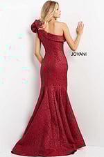 Back view of model in Jovani 05176 burgundy dress with dramatic ruffle detail.