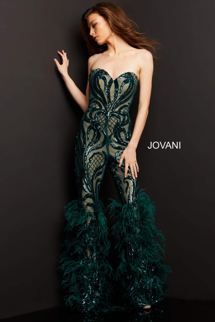 Model wearing Jovani 05669 green jumpsuit with sweetheart neckline and feathered hem.