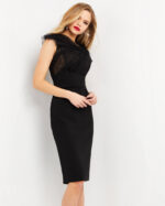 Model wearing Jovani 05674 black dress with lace details, side angle.