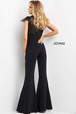 Back view of model wearing Jovani 05676 black jumpsuit with lace detail.