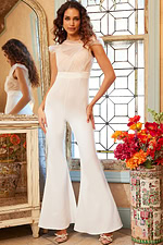 Front view of model wearing Jovani 05676 ivory jumpsuit, featuring flutter sleeves and lace overlay.