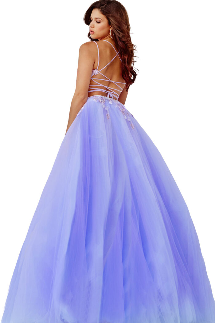 Model displaying the open back of Jovani 06207 lilac gown with floral accents.