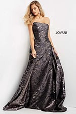 Model wearing Jovani 06255 gray gown with elegant flow and shimmering fabric.