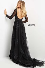back view of model wearing Jovani 06609 black gown with open back
