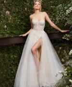 Detailed view of Jovani 06610 white gown's floral lace bodice and high slit.