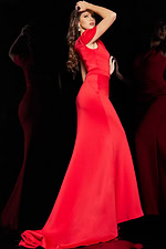 Model wearing Jovani 06753 red one-shoulder mermaid gown, back view.