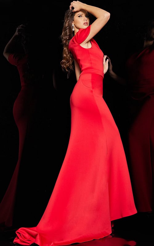 Model wearing Jovani 06753 red one-shoulder mermaid gown, back view.