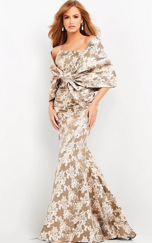 Model wearing Jovani 06760 beige mermaid dress with off-the-shoulder neckline.