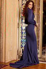Model wearing Jovani 06774 navy dress, back view