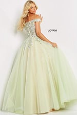 Model wearing Jovani 06794 off-the-shoulder ball gown with floral embroidery in multi colors, back view.