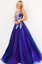 Model wearing Jovani 06807 dress in navy multi, front view highlighting flowing skirt.