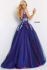 Model showcasing the back of Jovani 06807 dress in navy multi with open back design.