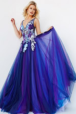 Model wearing Jovani 06807 gown in navy multi, front view with floral accents displayed.