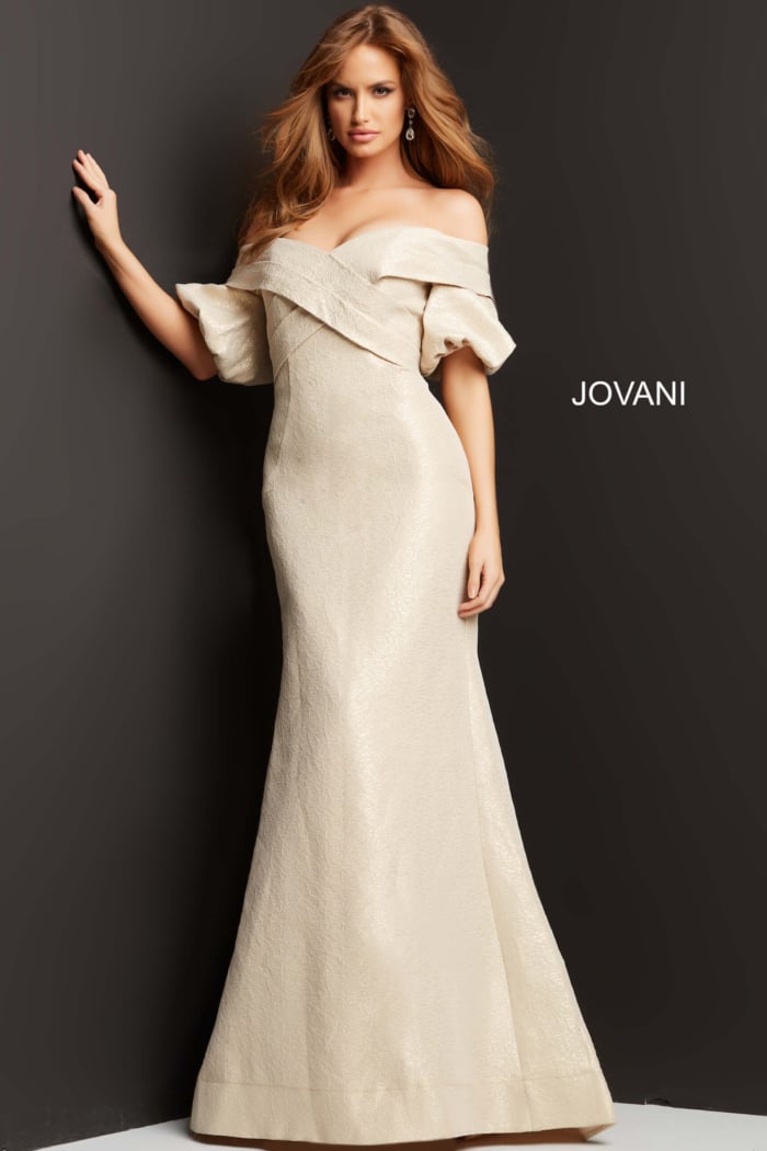 Model in Jovani 06831 beige dress, showcasing sophisticated design with elegant silhouette.