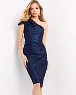 Model wearing Jovani 06834 blue dress with one-shoulder neckline.