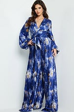 Model wearing Jovani 06849, 06850 in front view with multi-colored pattern and pleated design.