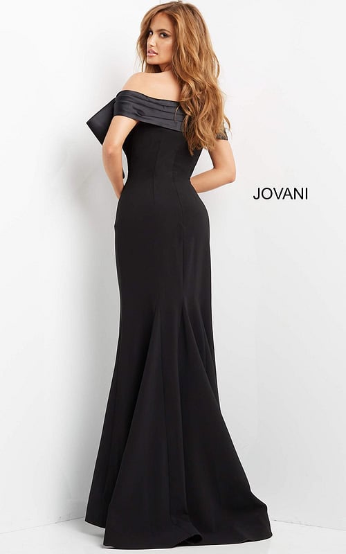 Back view of model in Jovani 07014 black mermaid dress.