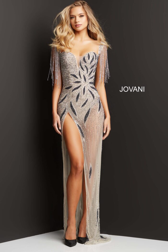 Model wearing Jovani 07031 nude gown with high slit and bead embellishments.