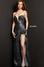 Model wearing Jovani 07068 black gown with sequins and feather details, front view.