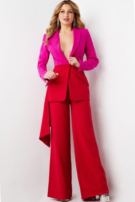 Model wearing Jovani 07093 fuchsia blazer and red wide-leg trousers with side drape front view.