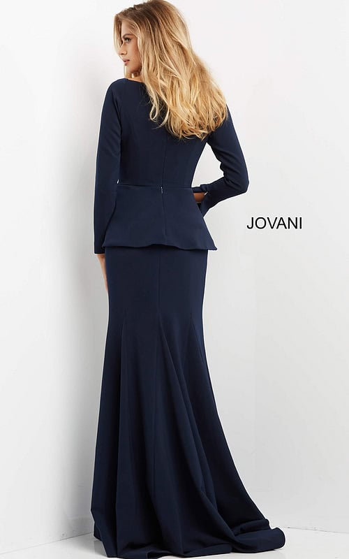 Back view of model in Jovani 07131 navy mermaid dress showing peplum detail.