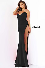 Model wearing Jovani 07138 black dress with sweetheart neckline and high slit from the front view.