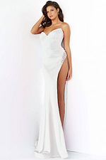 Model wearing Jovani 07138 white dress with sweetheart neckline and high slit from the front view.