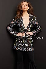 Model in Jovani 07191 multi-colored dress, displaying the playful number pattern.
