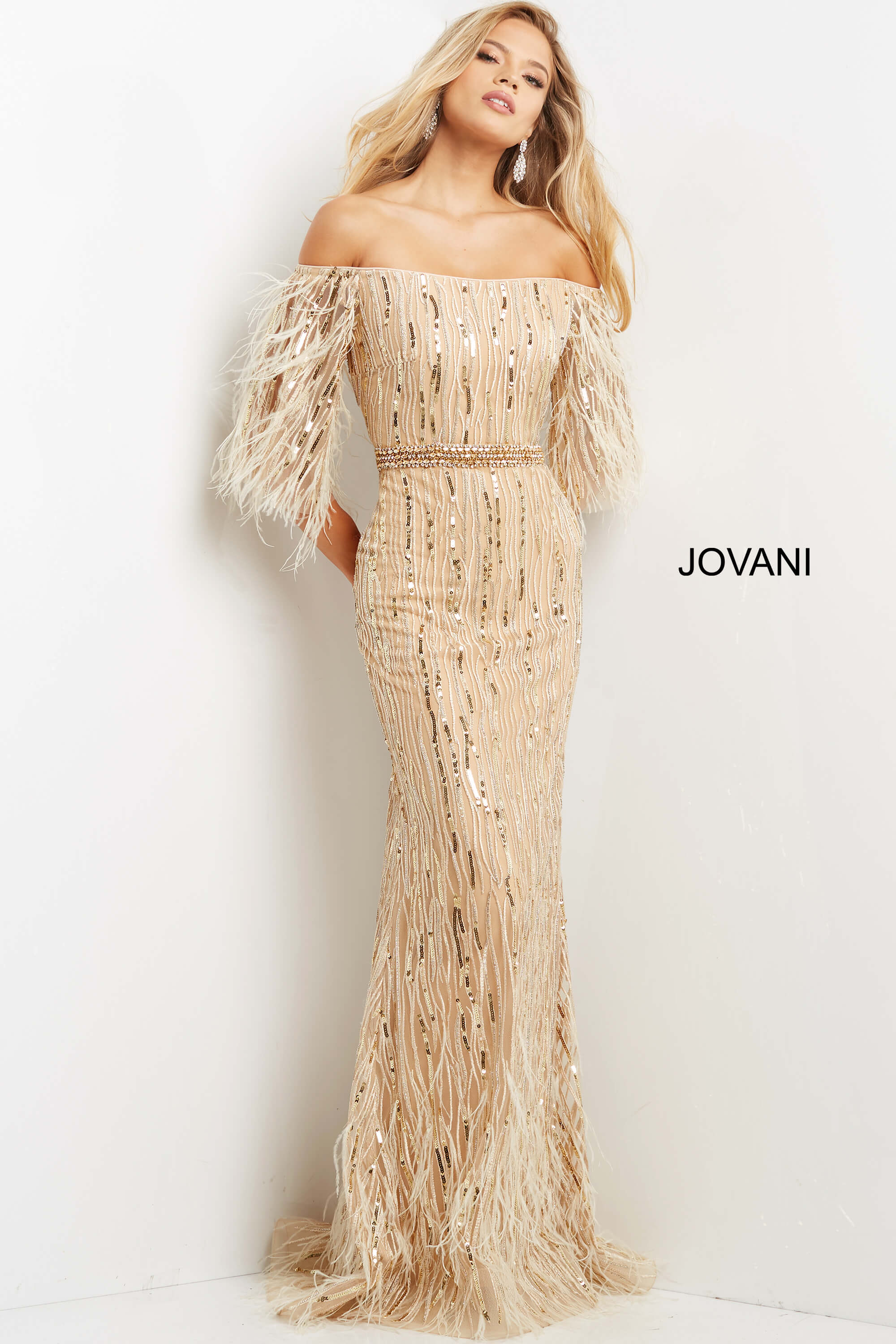 07195-Gold-205.jpg Model wearing Jovani 07195 beige gown with off-the-shoulder neckline and feather sleeves, front view.