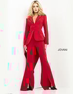 Model wearing Jovani 07209 red ensemble with blazer and trousers, front view