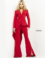 Model wearing Jovani 07209 red ensemble with blazer and trousers, front view