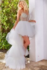 model wearing Jovani 07231 white high-low dress with side view