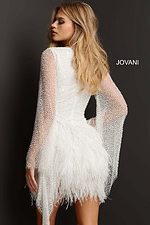 Model wearing Jovani 07236, showcasing the back of the white dress with sheer beaded sleeves.