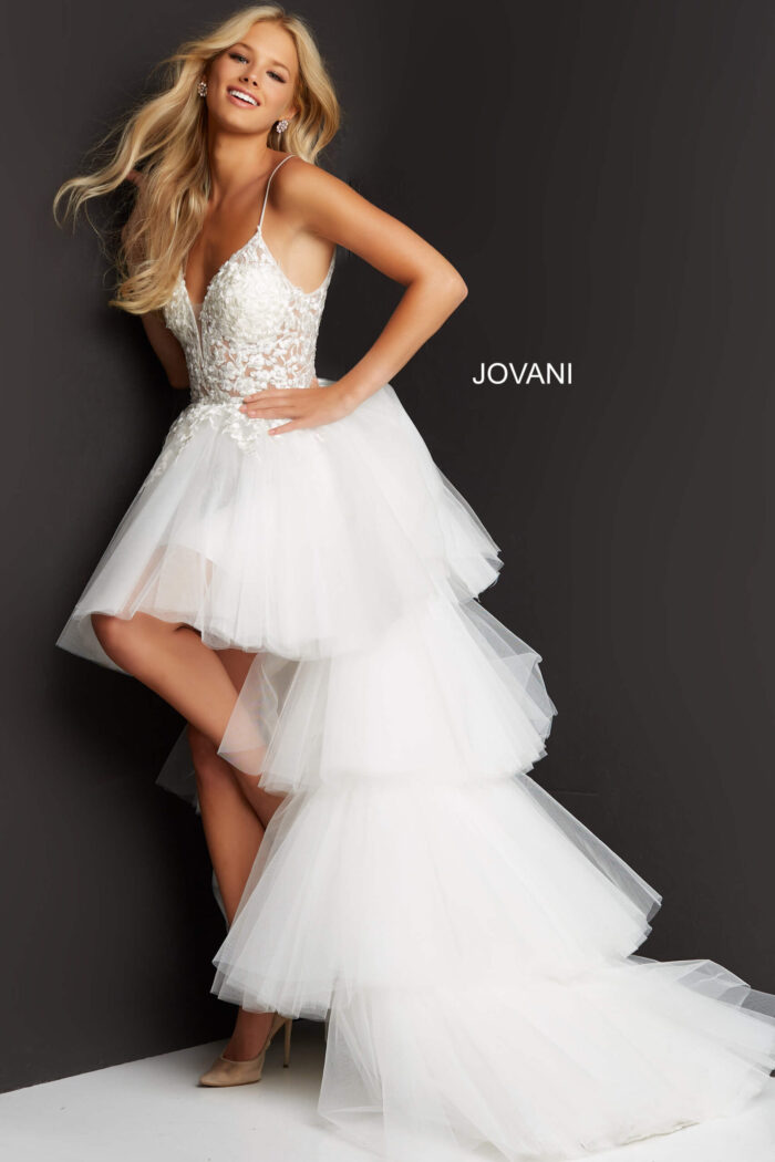 Model wearing Jovani 07263 white high-low dress with floral embroidery