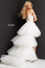 Back view of model wearing Jovani 07263 white high-low dress