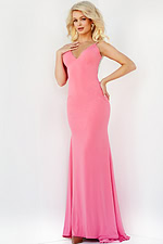 Model wearing Jovani 07297 in hot pink, front view.