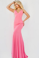 Model wearing Jovani 07297 in hot pink, front view.