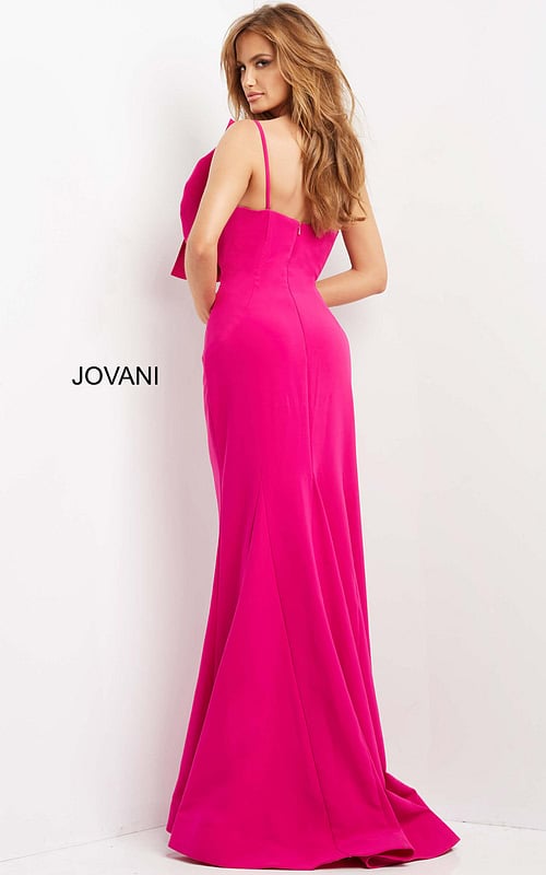 Model wearing Jovani 07306, fuchsia dress, back view with low cut and straps.