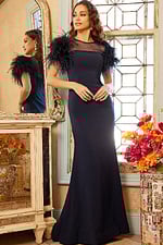 Model showcasing Jovani 07432 navy dress front view with a sheer neckline.