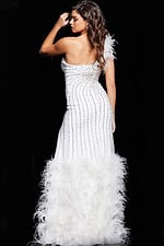 back view of model wearing 07508 white gown showcasing feathered hem