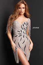Model wearing Jovani 07577 nude dress with sweetheart neckline and bead embellishments.