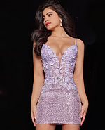 Model in Jovani 07668 pink dress with deep V-neckline and sequin details