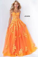 Model wearing Jovani 07901 orange gown showcasing floral applique