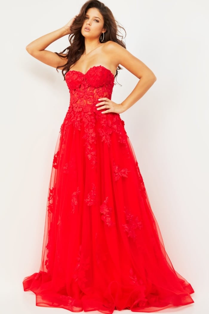 Model wearing Jovani 07901 red gown displaying floral pieces