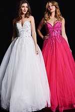 Models in Jovani 07946 gowns in white and fuchsia with beadwork and tulle skirts