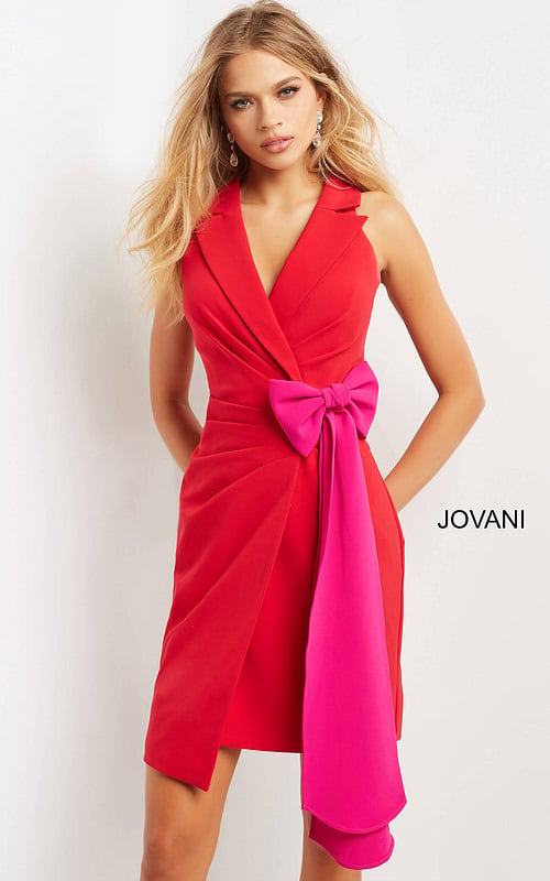 model wearing Jovani 07961 red dress with fuchsia bow detail, front view