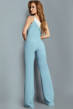 Back view of model wearing Jovani 08011 seafoam green jumpsuit, highlighting the design.