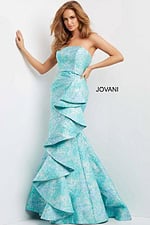 Model in Jovani 08093 blue multi-color dress with strapless neckline and ruffle details, front view.