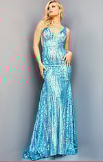 Model wearing Jovani 22770 gown with sequin embellishments and deep V-neckline.